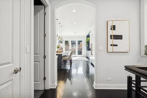 a spacious bathroom with a double vanity sink and a mirror