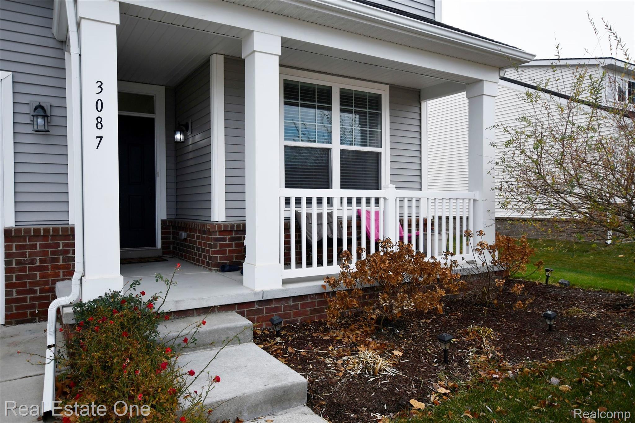 3087 Curtis Road Wixom, MI 48393 - Photo 3 of 36 Front Porch.jpg