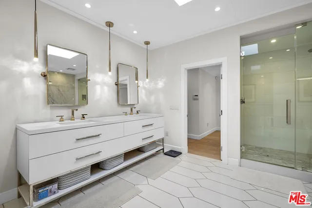 a bathroom with a bathtub and shower