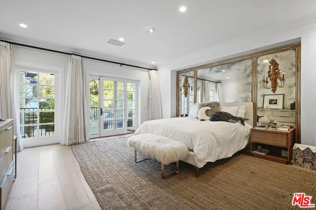 a room with furniture and a wooden floor