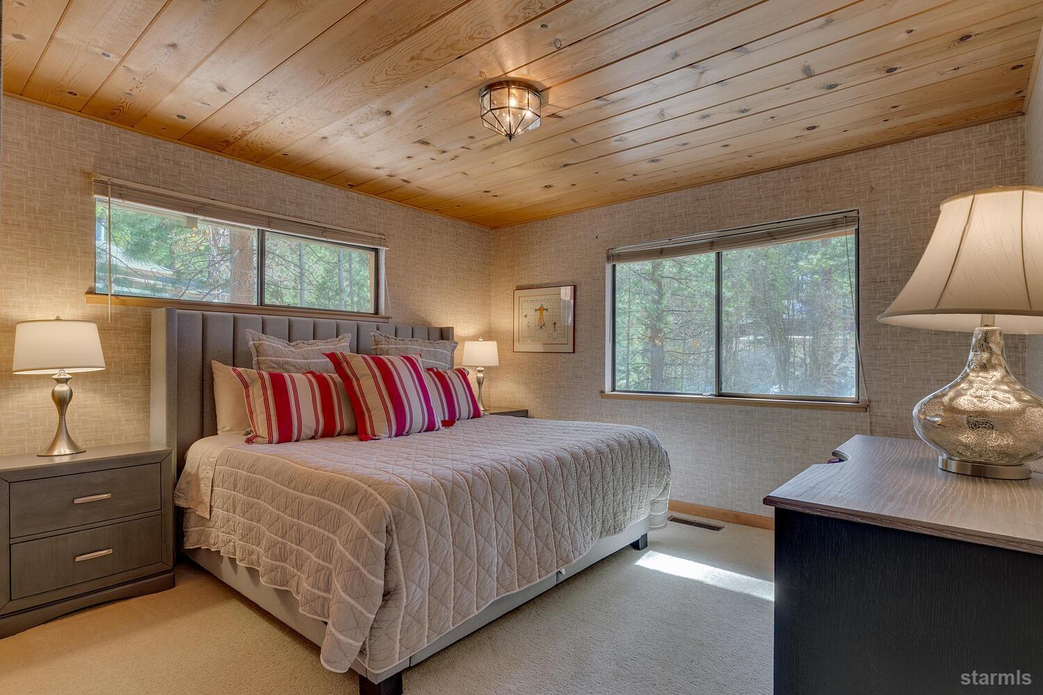 345 Granite Drive Stateline, NV 89449 - Photo 15 of 24 a bedroom with a bed and window