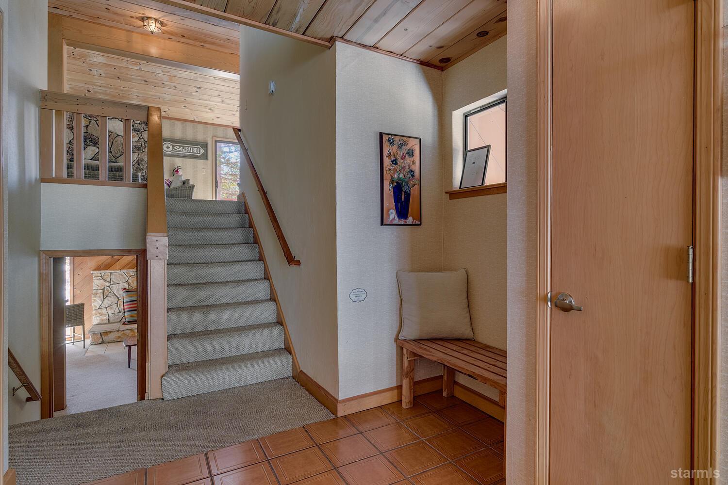 345 Granite Drive Stateline, NV 89449 - Photo 3 of 24 a view of a hallway with entryway and stairs