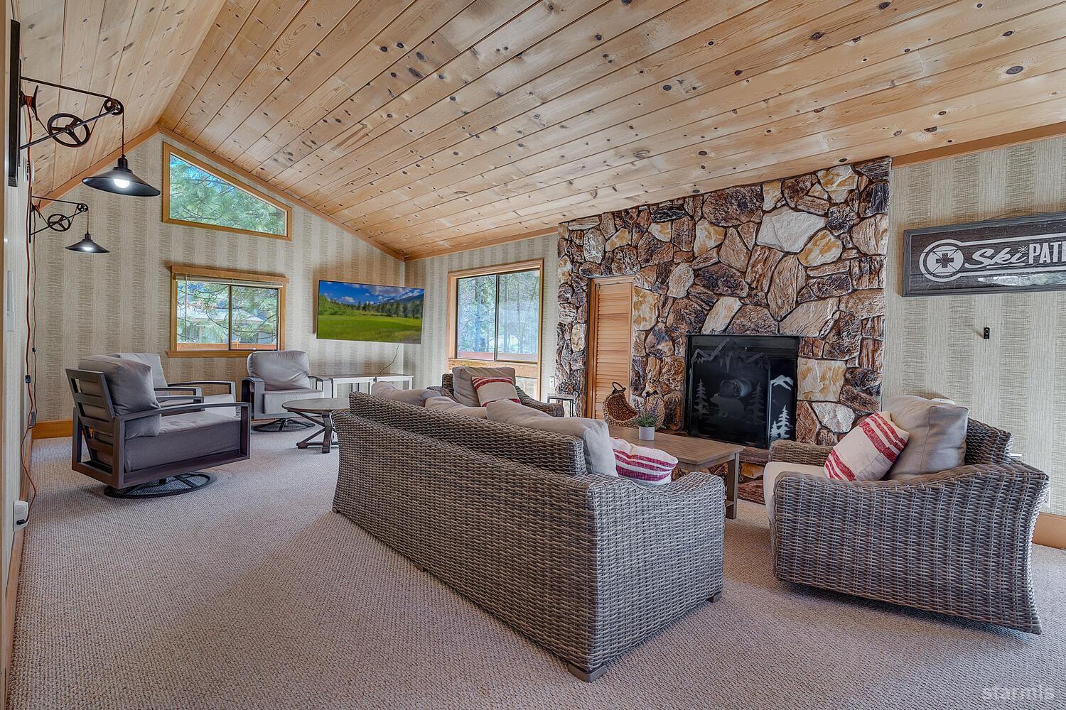 345 Granite Drive Stateline, NV 89449 - Photo 4 of 24 a living room with furniture and a fireplace