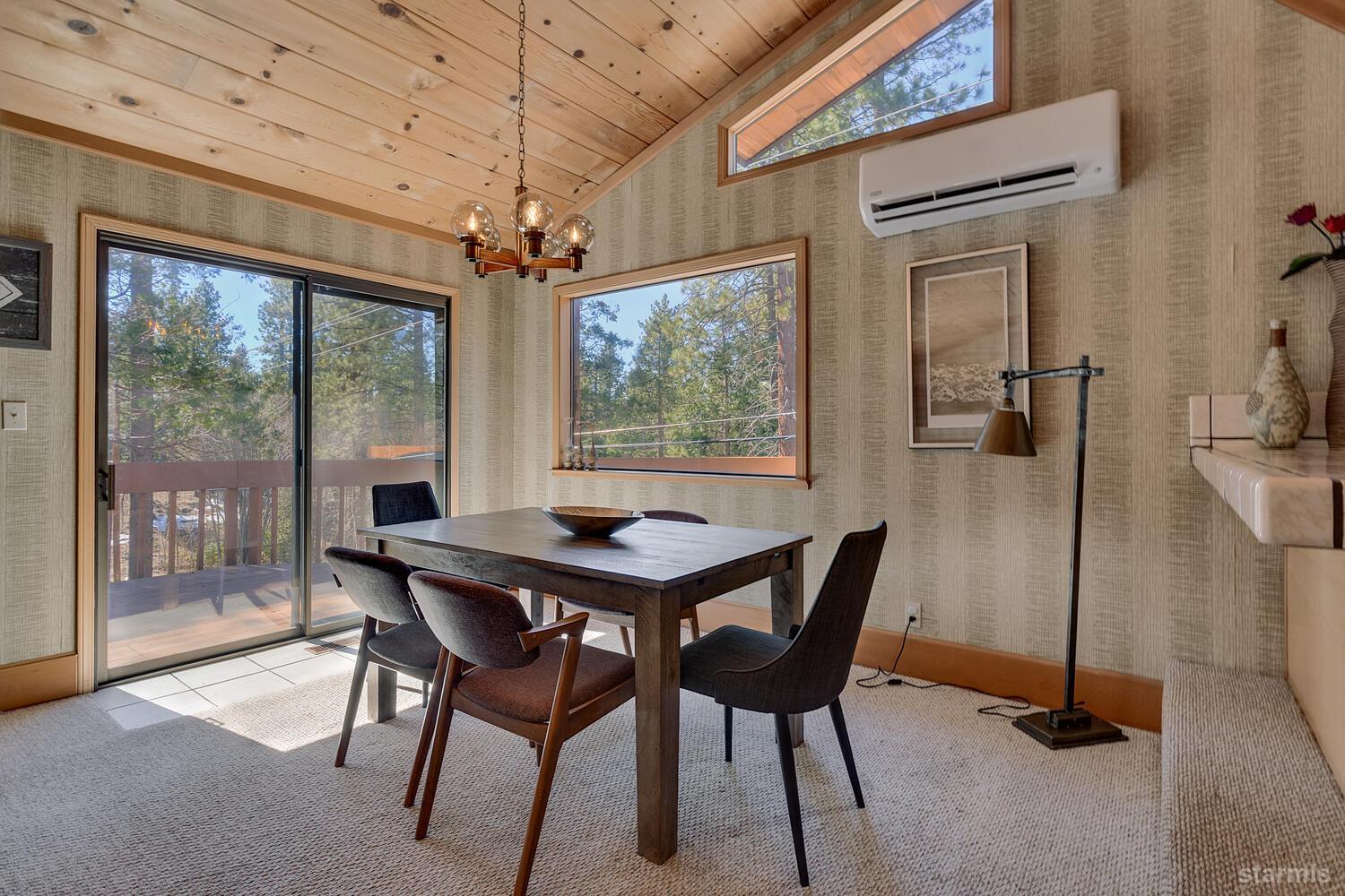 345 Granite Drive Stateline, NV 89449 - Photo 7 of 24 a view of a dining room with furniture window and outside view
