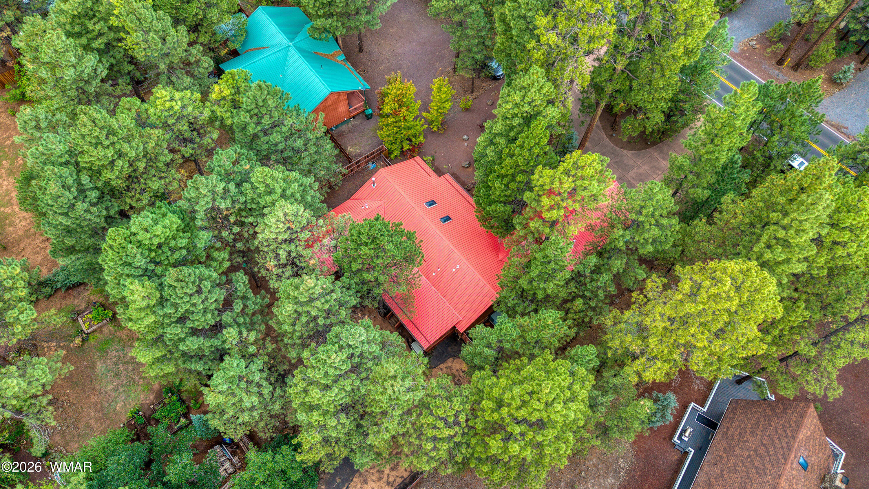 5155 Buck Springs Road Pinetop, AZ 85935 - Photo 35 of 37 an aerial view of a house with a yard and lake view