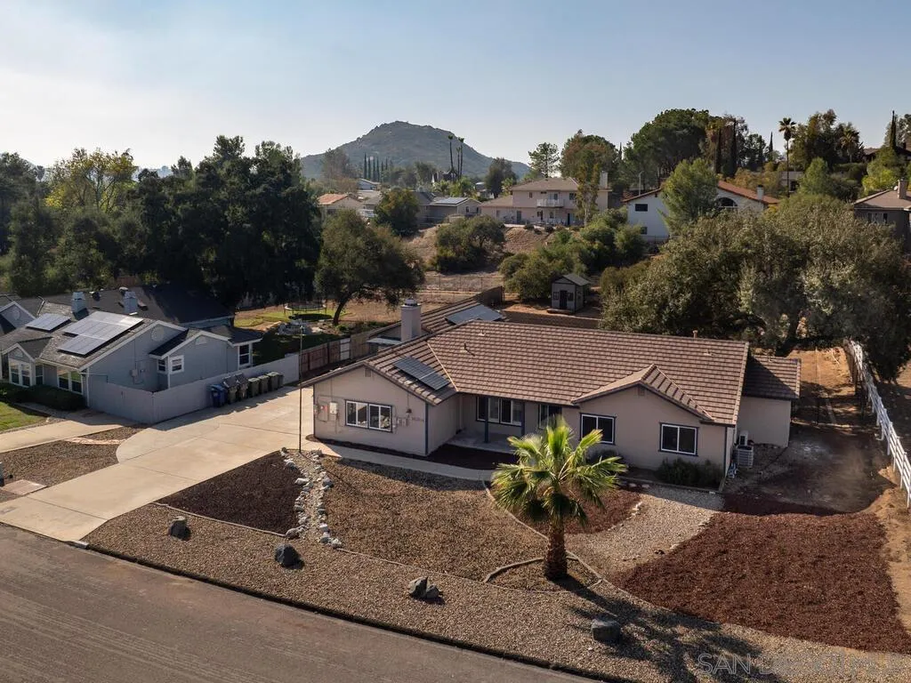16304 Dartolo Road Ramona, CA 92065 - Photo 32 of 36 an aerial view of a house with garden space and street view