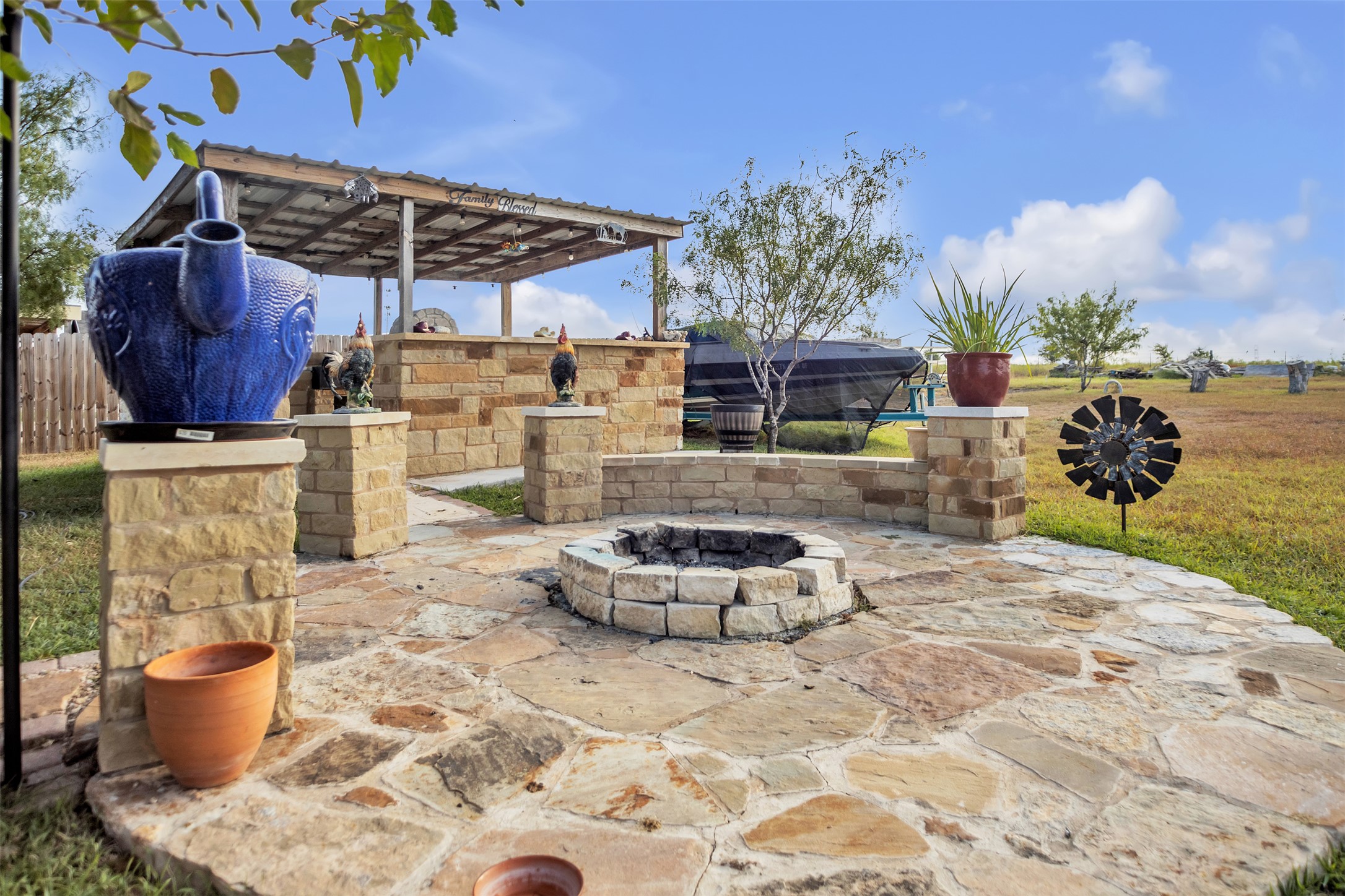 363 El Rey Drive Kyle, TX 78640 - Photo 31 of 40 View of patio / terrace featuring an outdoor fire pit