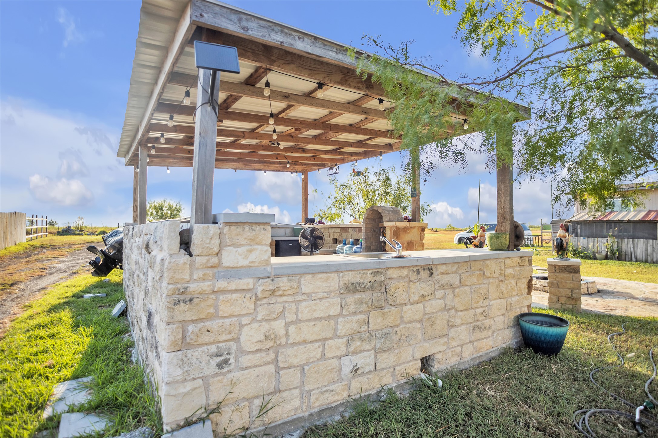 363 El Rey Drive Kyle, TX 78640 - Photo 33 of 40 View of patio / terrace with exterior kitchen and a sink