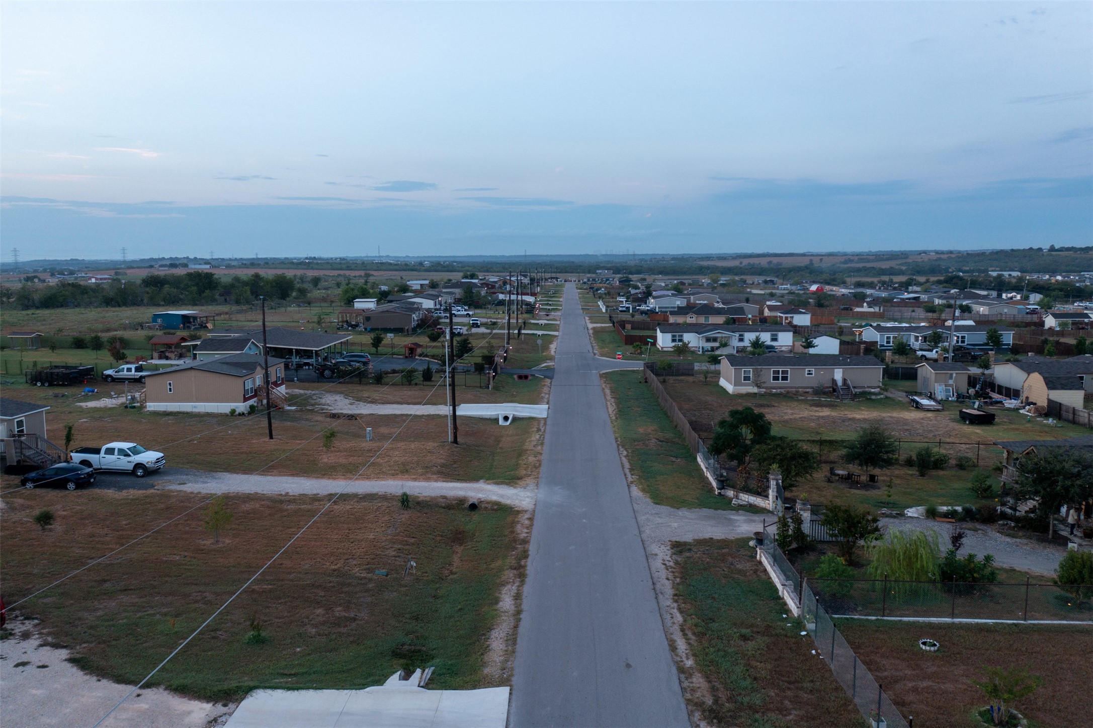 363 El Rey Drive Kyle, TX 78640 - Photo 5 of 40 Aerial view of property and surrounding area with nearby suburban area