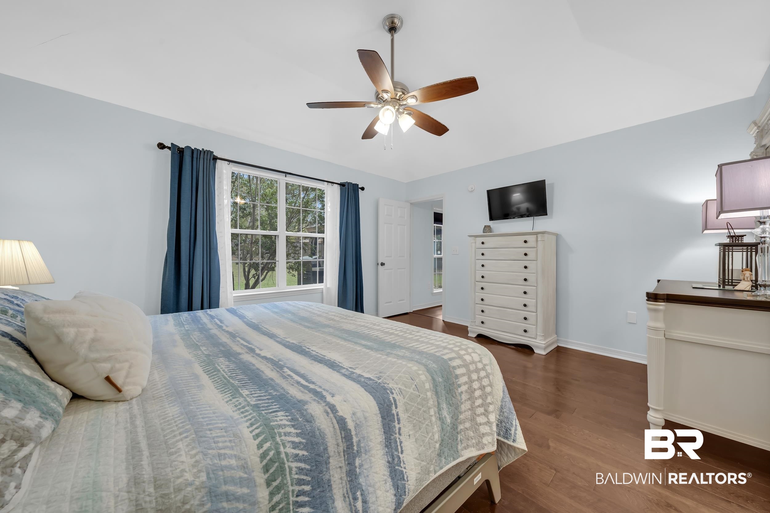 191 Robbins Boulevard Daphne, AL 36526 - Photo 11 of 24 Bedroom with dark wood-style floors and a ceiling fan