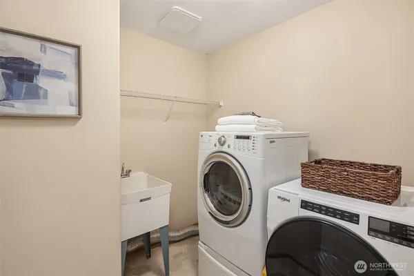 a utility room with dryer and washer