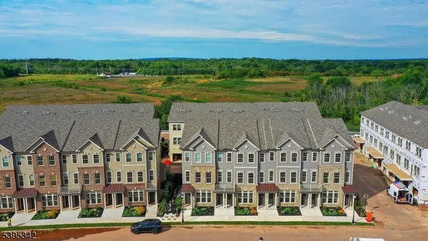 a view of a big yard and city view