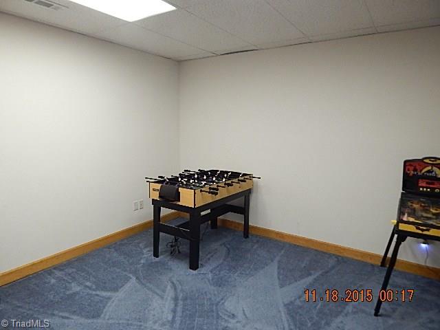 1077 Slate Road King, NC 27021 - Photo 18 of 30 Playroom finished in basement.