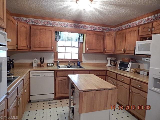 1077 Slate Road King, NC 27021 - Photo 3 of 30 Another view of great kitchen.
