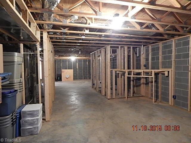 1077 Slate Road King, NC 27021 - Photo 27 of 30 The basement has tons of expansion possibilities.