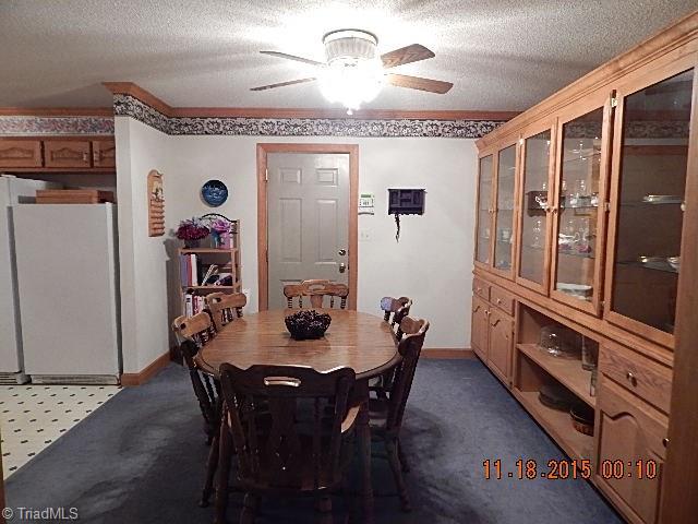 1077 Slate Road King, NC 27021 - Photo 5 of 30 Spacious dining.