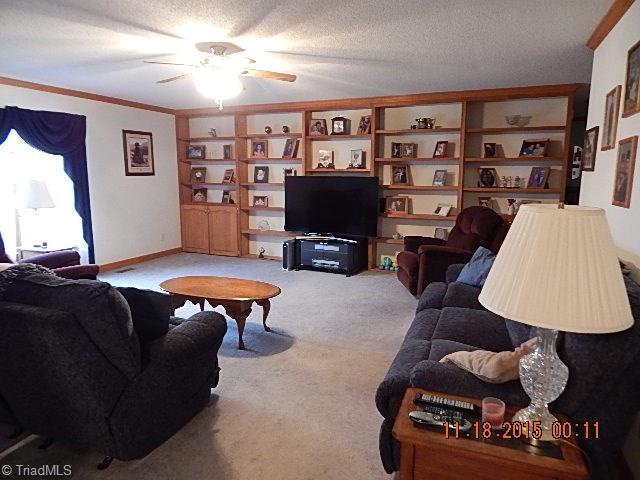 1077 Slate Road King, NC 27021 - Photo 6 of 30 Huge living room for family gatherings!