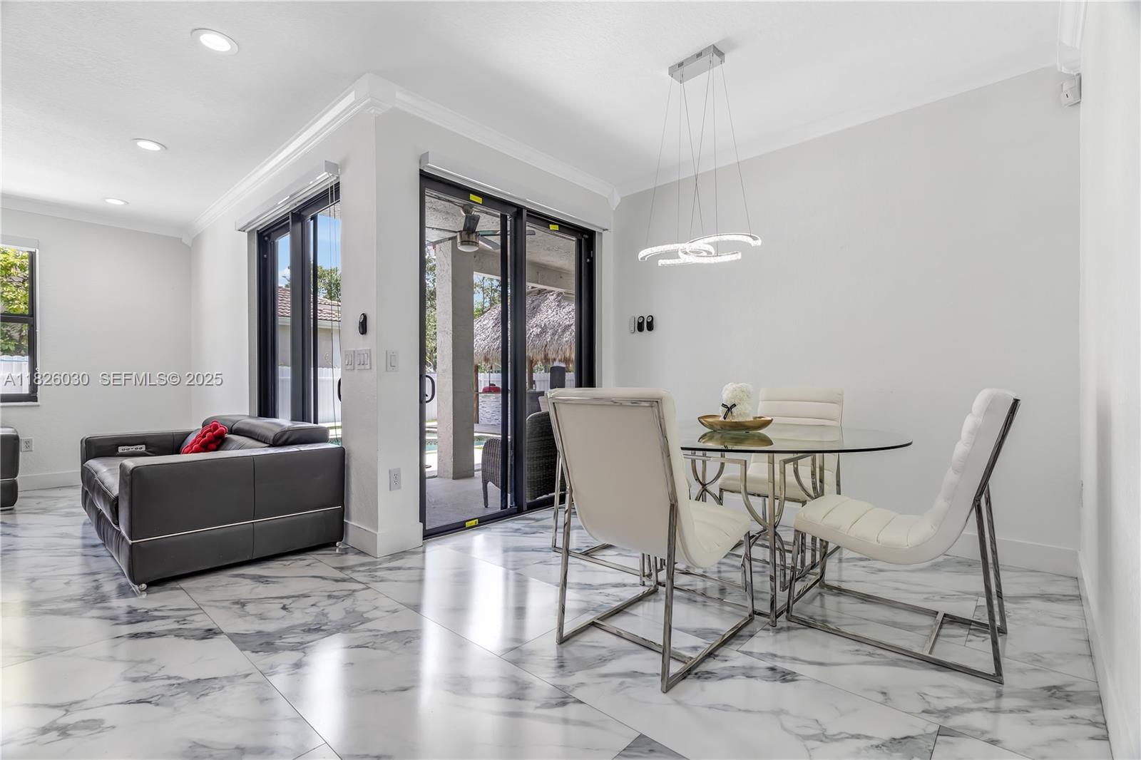 16488 Southwest 30th Street Miramar, FL 33027 - Photo 14 of 50 a living room with furniture and a window