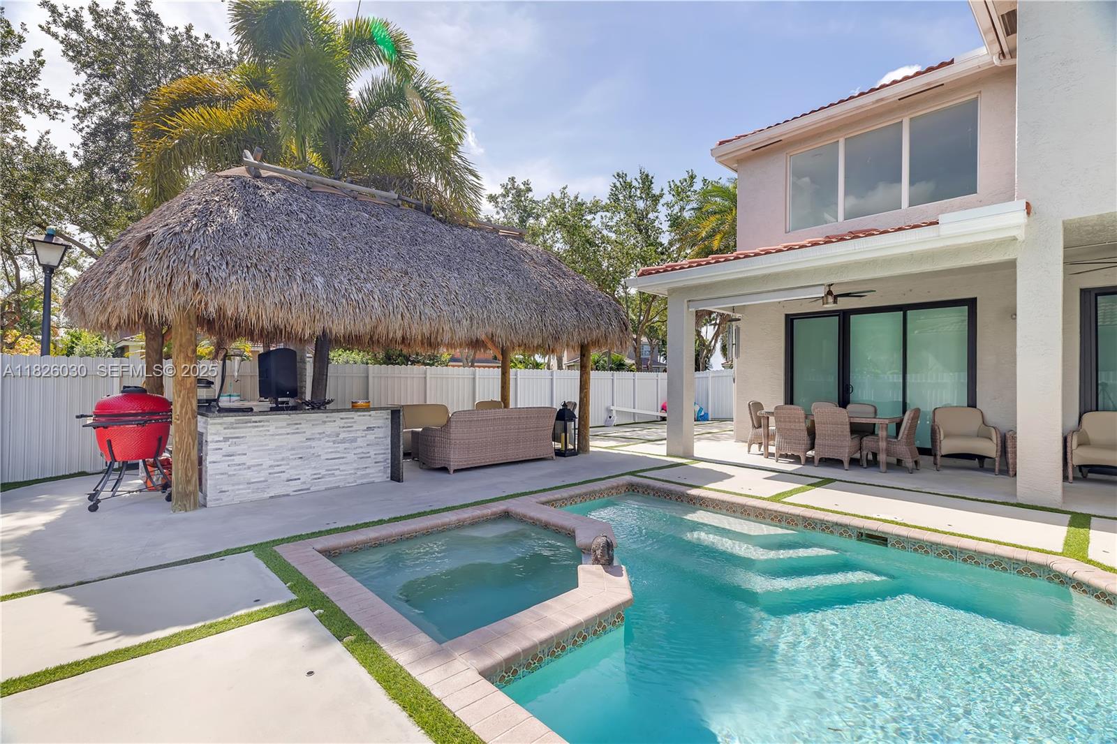 16488 Southwest 30th Street Miramar, FL 33027 - Photo 38 of 50 a view of a house with backyard and sitting area