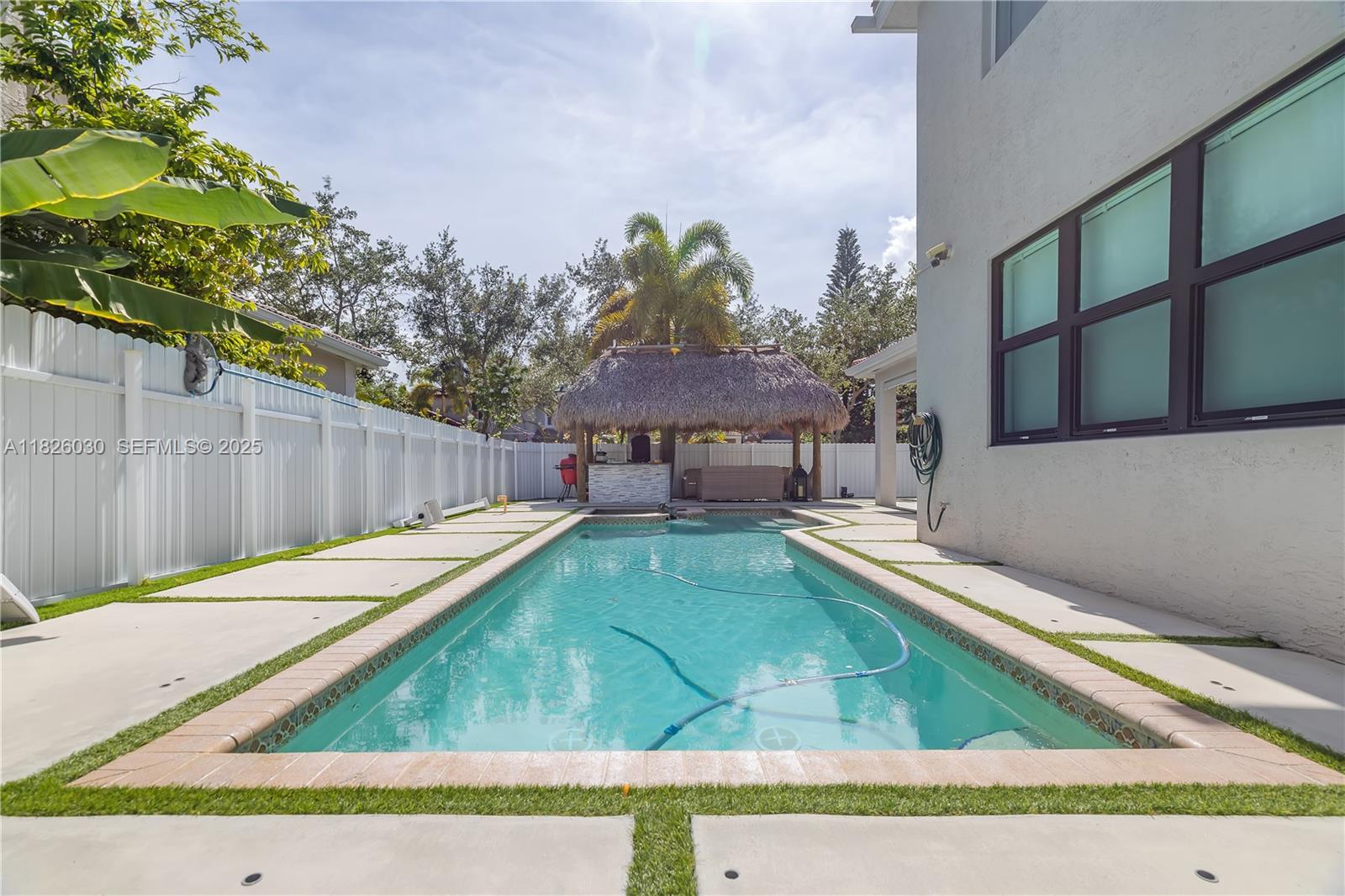 16488 Southwest 30th Street Miramar, FL 33027 - Photo 39 of 50 a view of a backyard with a patio