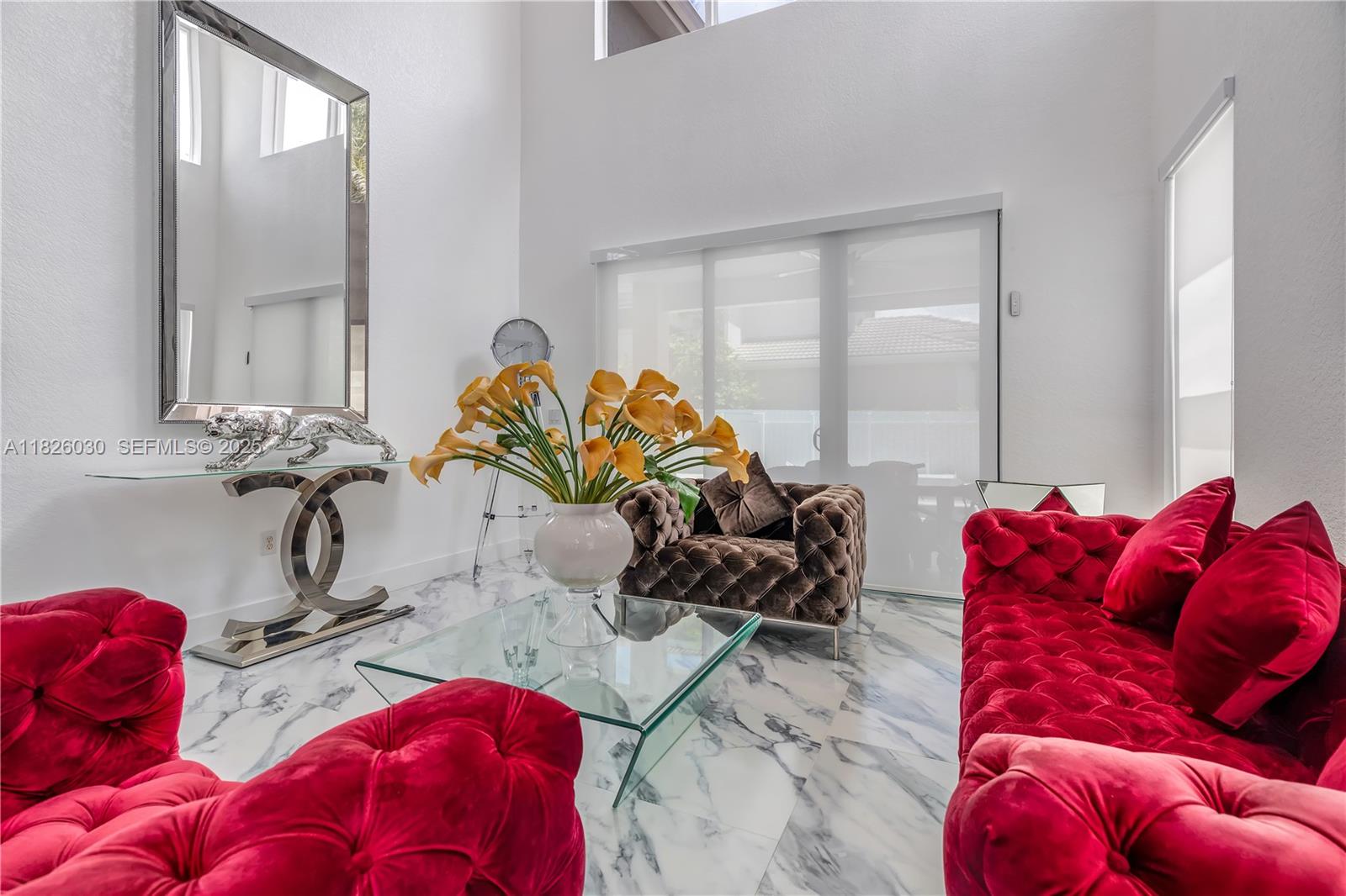 16488 Southwest 30th Street Miramar, FL 33027 - Photo 4 of 50 a living room with furniture and a potted plant