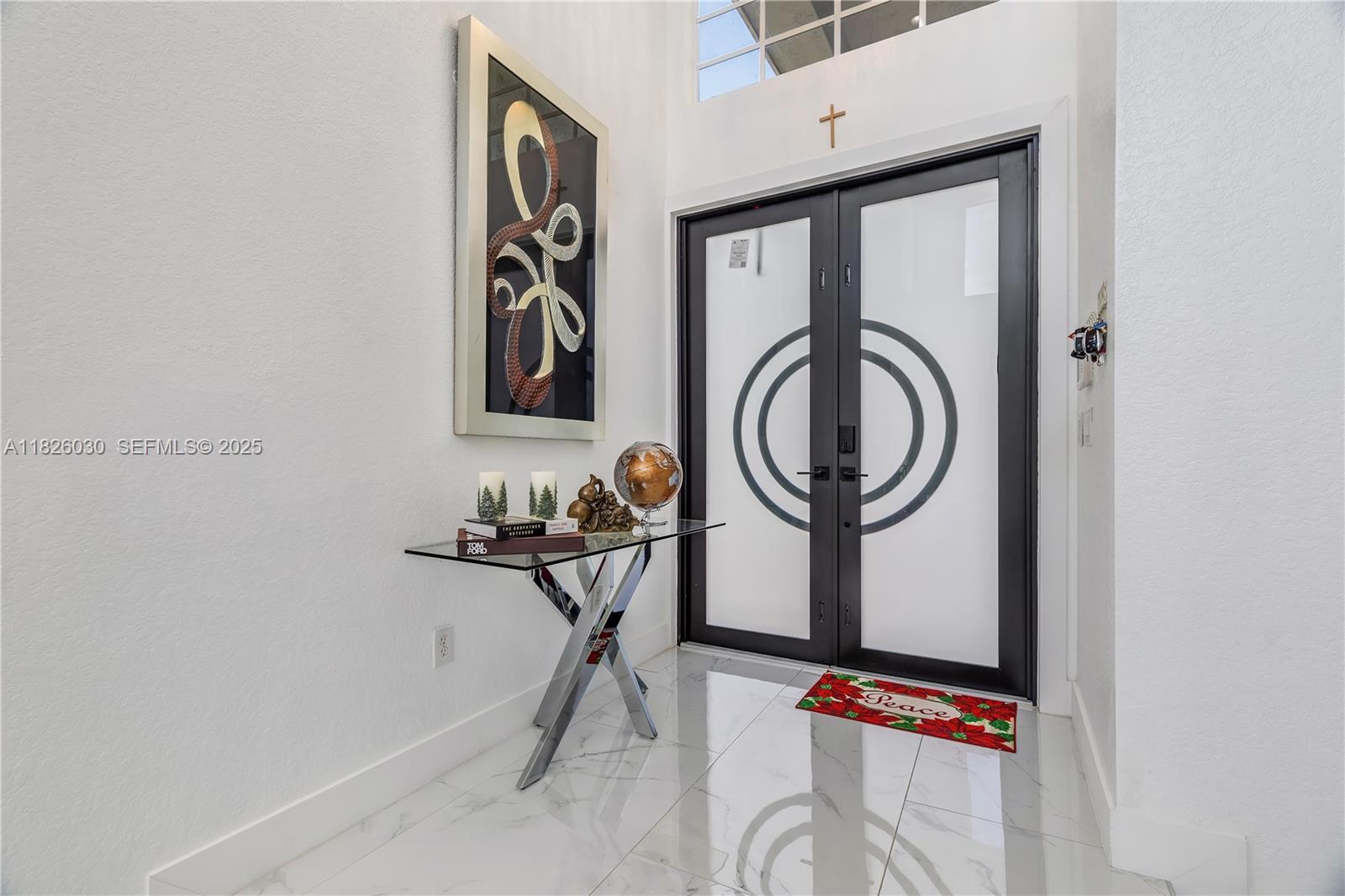 16488 Southwest 30th Street Miramar, FL 33027 - Photo 50 of 50 a bathroom with a mirror and a sink