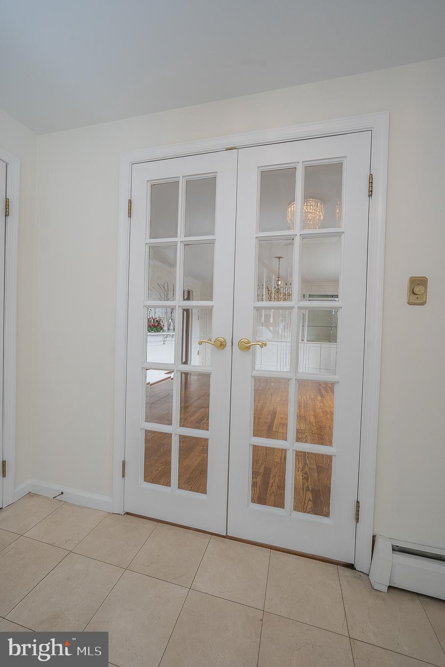 315 Saybrook Road Villanova, PA 19085 - Photo 13 of 79 French Doors open up to Dining Room