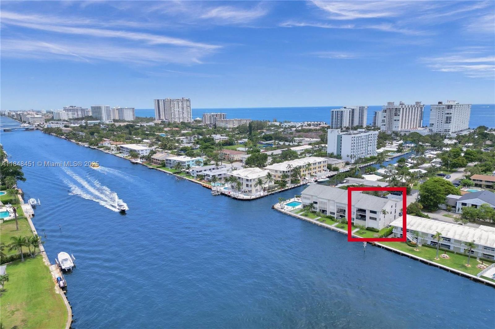 1101 South Riverside Drive, Unit 301 Pompano Beach, FL 33062 - Photo 2 of 40 a city view with tall buildings