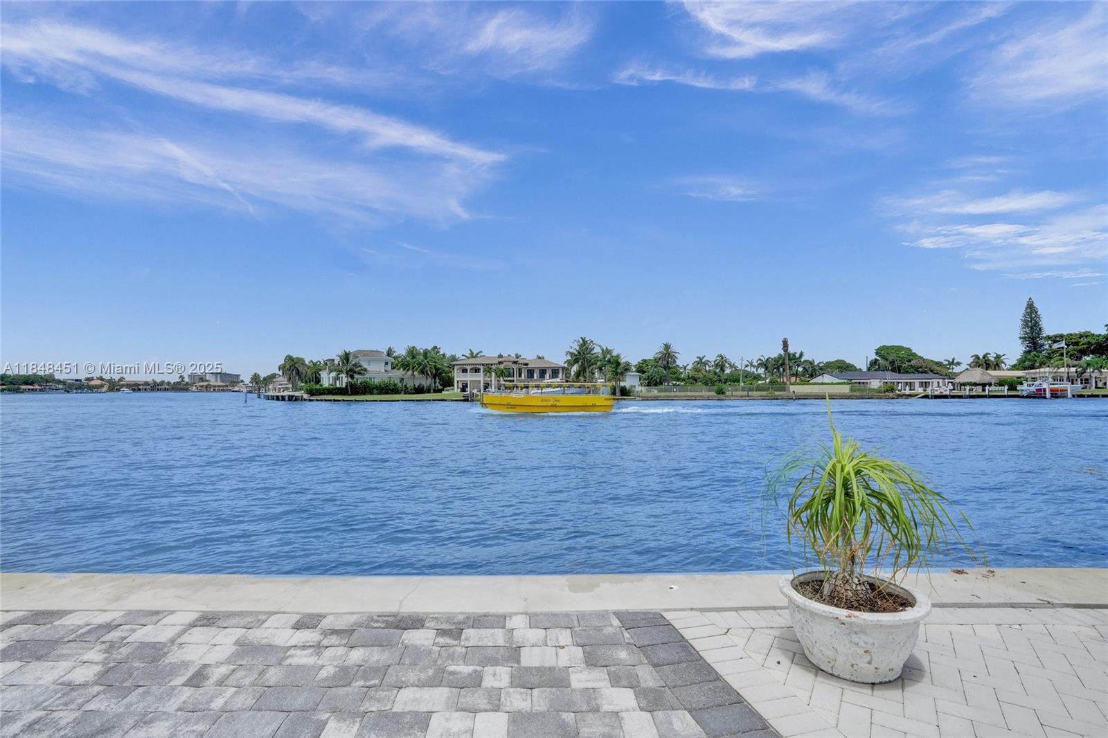 1101 South Riverside Drive, Unit 301 Pompano Beach, FL 33062 - Photo 30 of 40 a view of fountain in middle of the lake