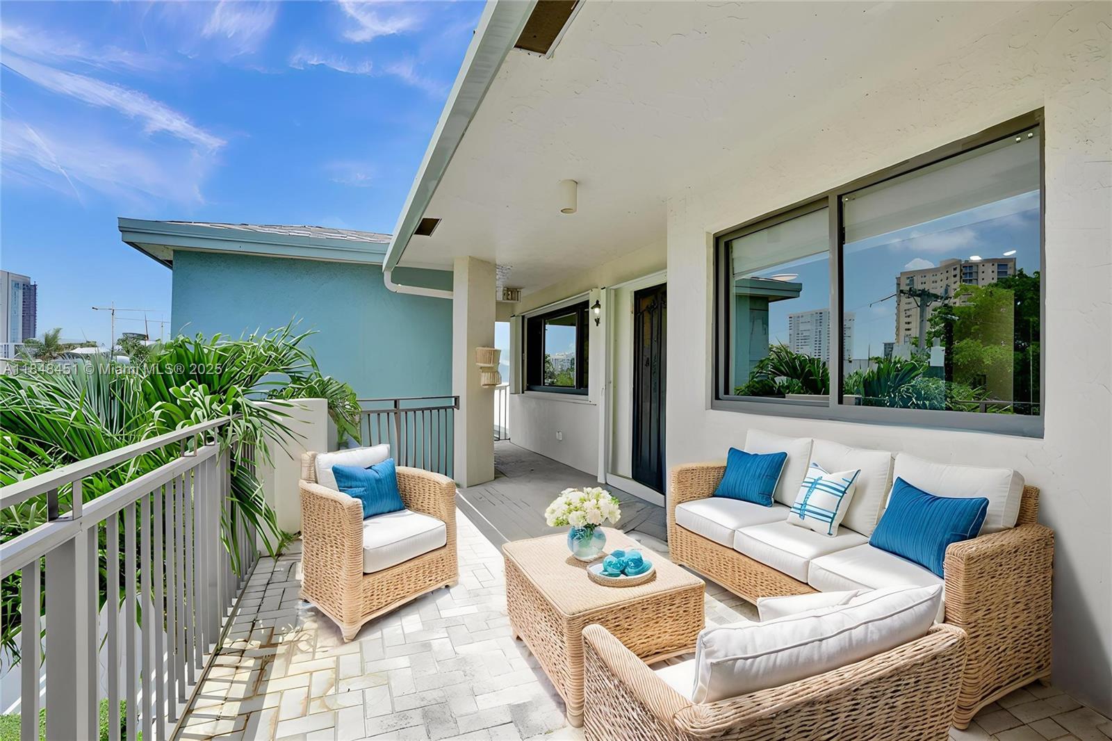 1101 South Riverside Drive, Unit 301 Pompano Beach, FL 33062 - Photo 10 of 40 a outdoor living space with furniture and garden view