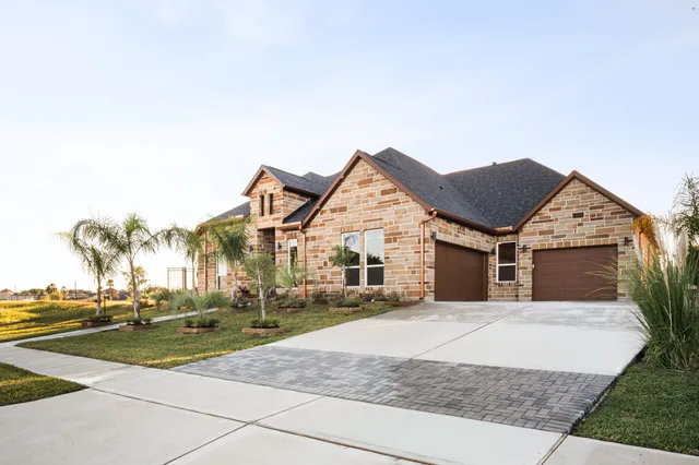 a view of house with yard and mountain view