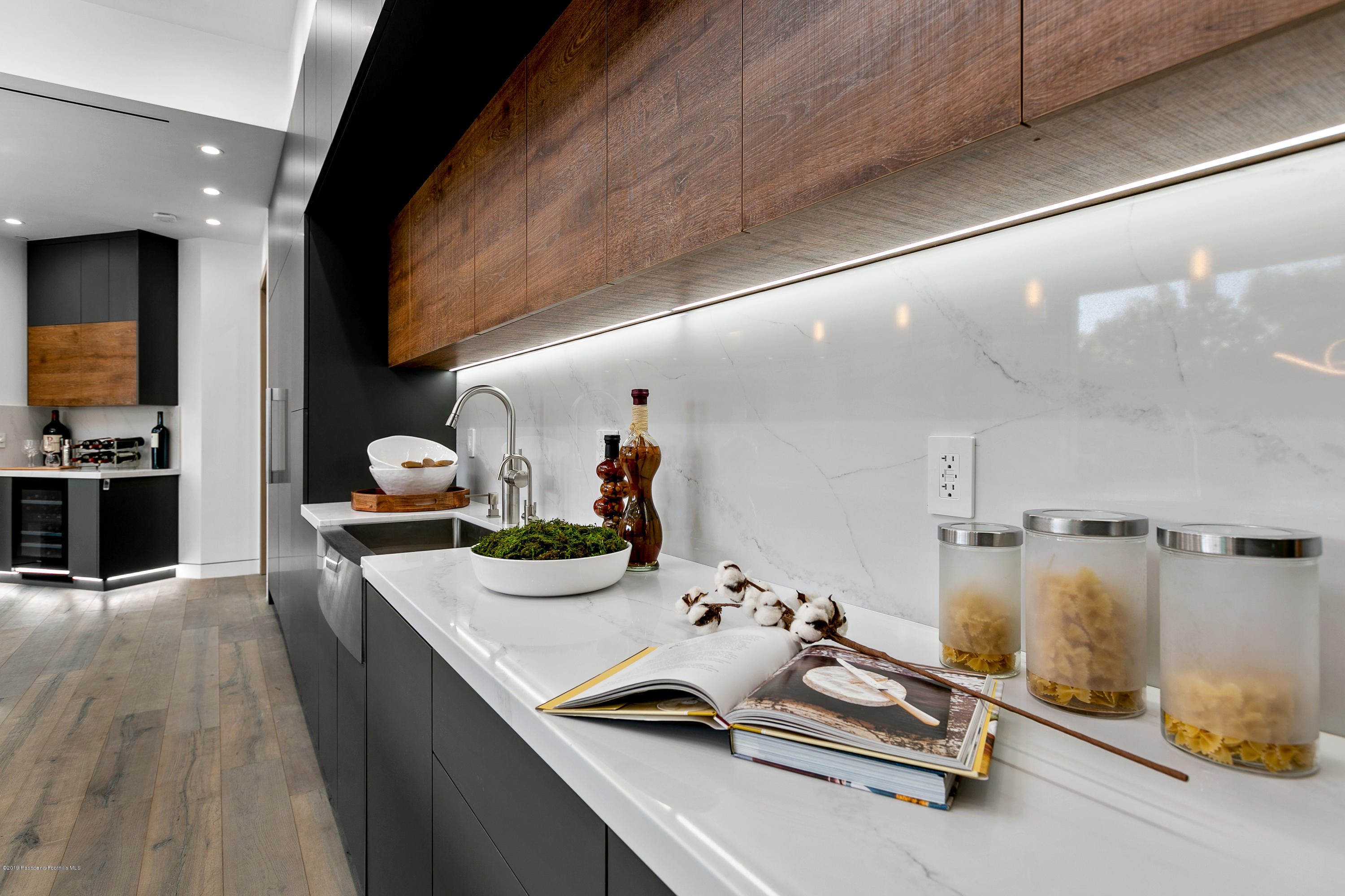 4402 Wasatch Drive La Canada Flintridge, CA 91011 - Photo 11 of 62 a kitchen with sink refrigerator and stove