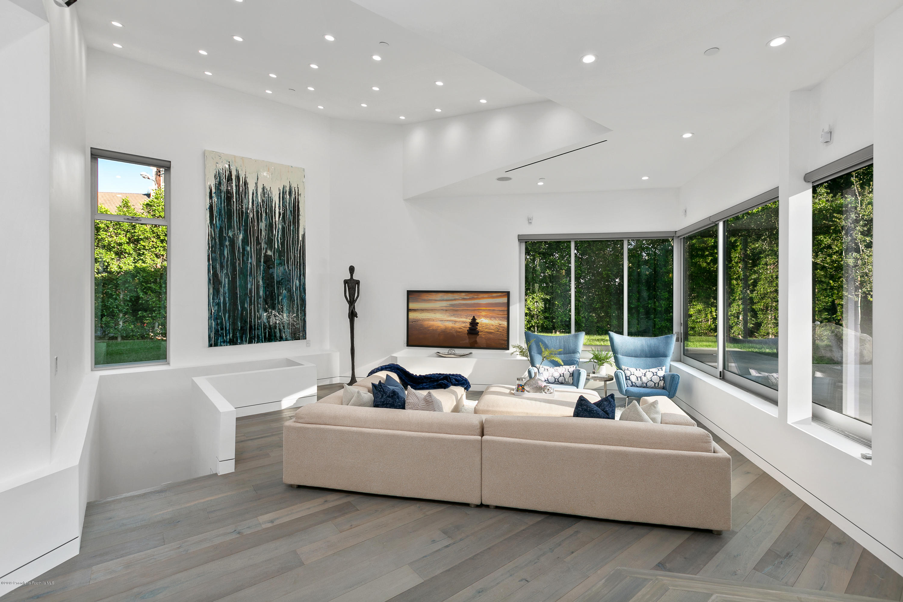 4402 Wasatch Drive La Canada Flintridge, CA 91011 - Photo 15 of 62 a living room with furniture and a large window