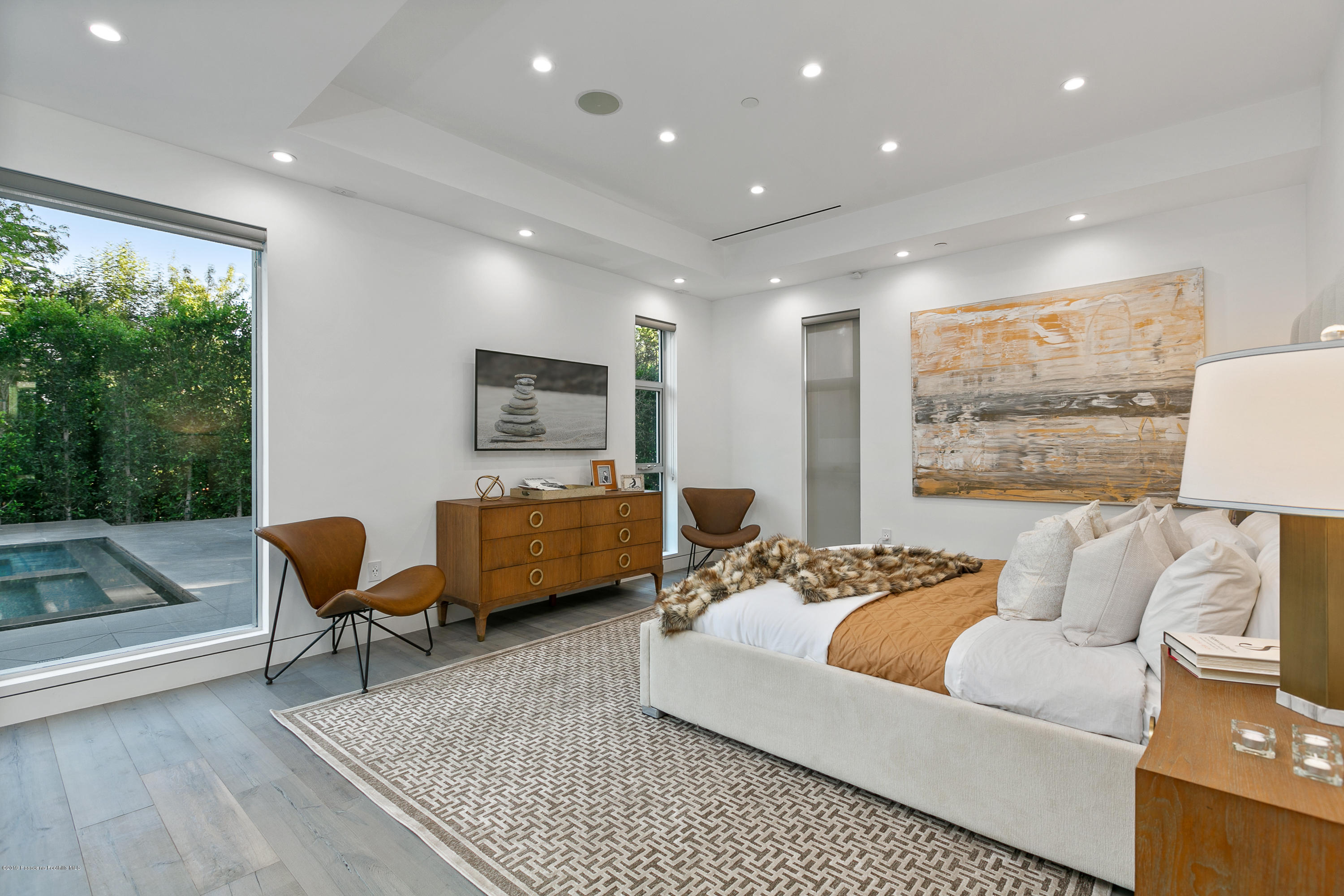 4402 Wasatch Drive La Canada Flintridge, CA 91011 - Photo 21 of 62 a living room with furniture kitchen view and a large window