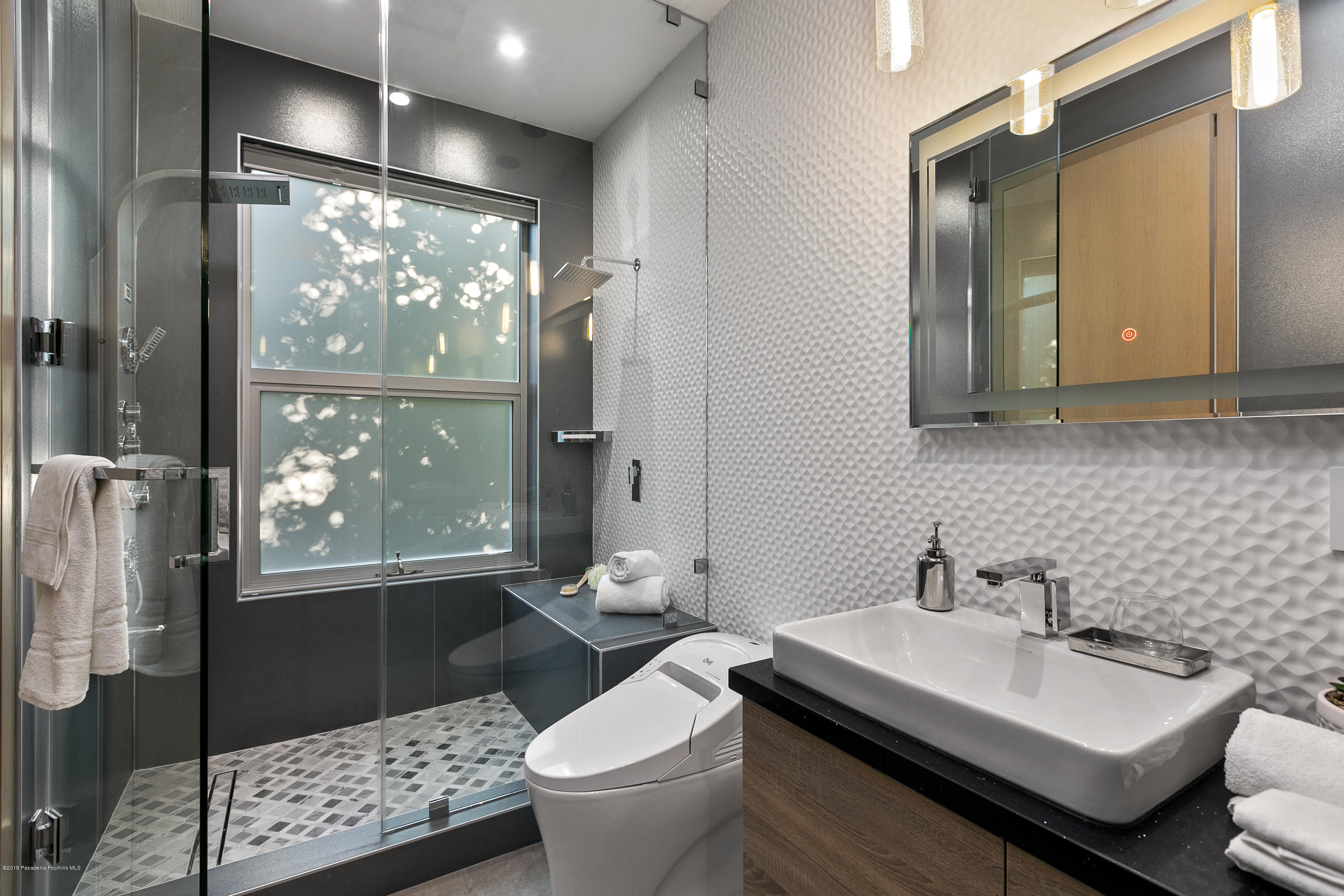 4402 Wasatch Drive La Canada Flintridge, CA 91011 - Photo 25 of 62 a bathroom with a sink toilet and shower