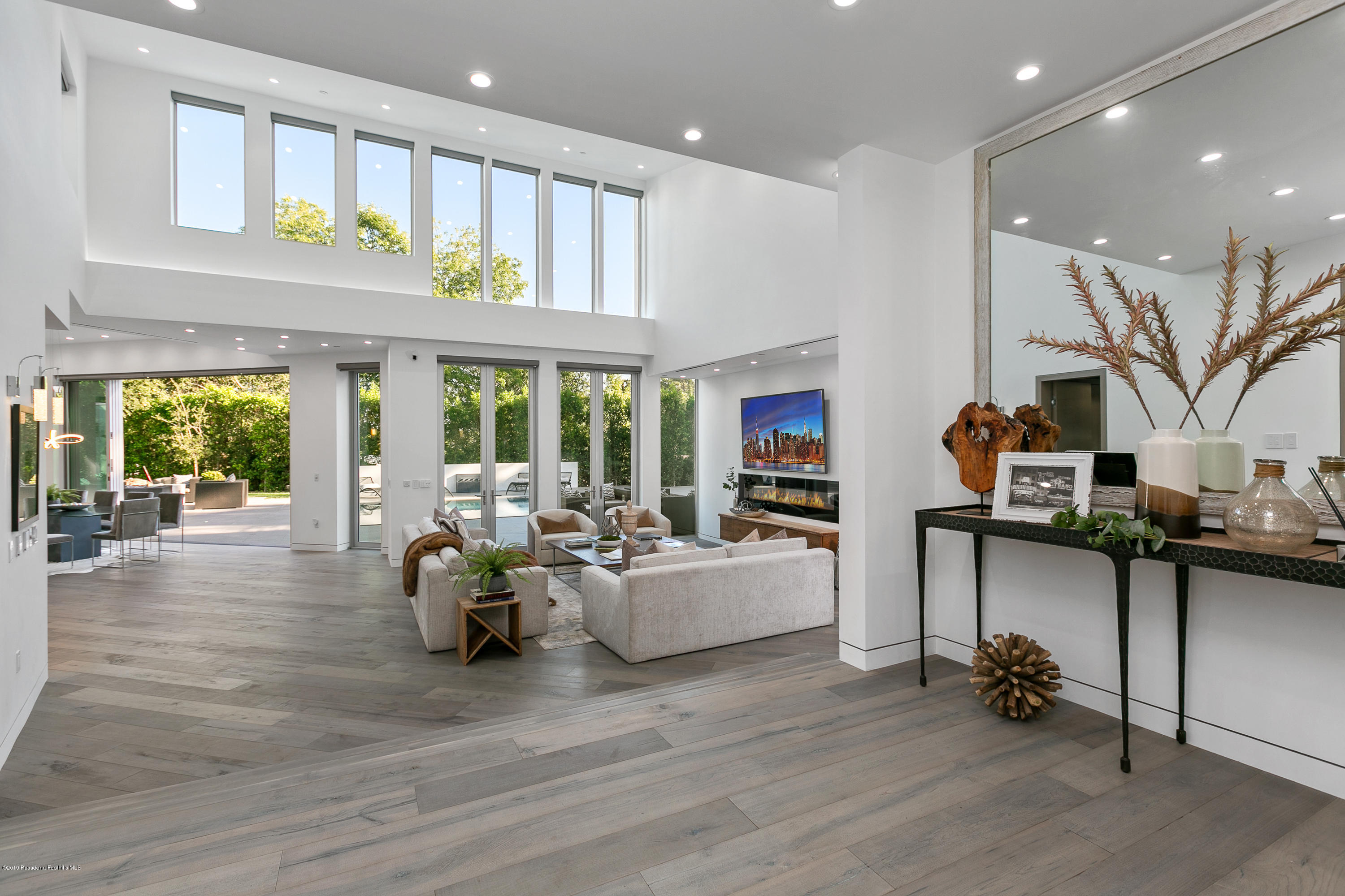 4402 Wasatch Drive La Canada Flintridge, CA 91011 - Photo 4 of 62 a living room with fireplace furniture and a wooden floor