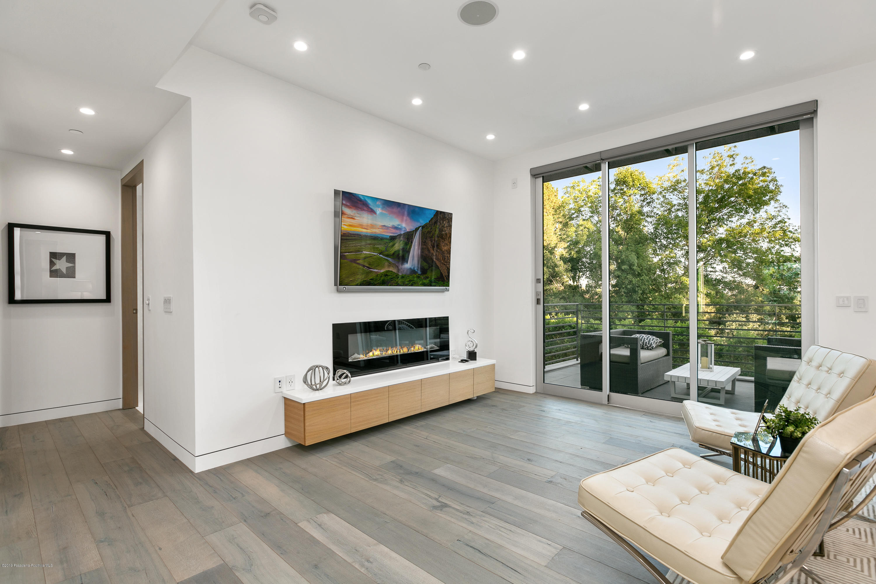 4402 Wasatch Drive La Canada Flintridge, CA 91011 - Photo 31 of 62 a living room with furniture and a flat screen tv