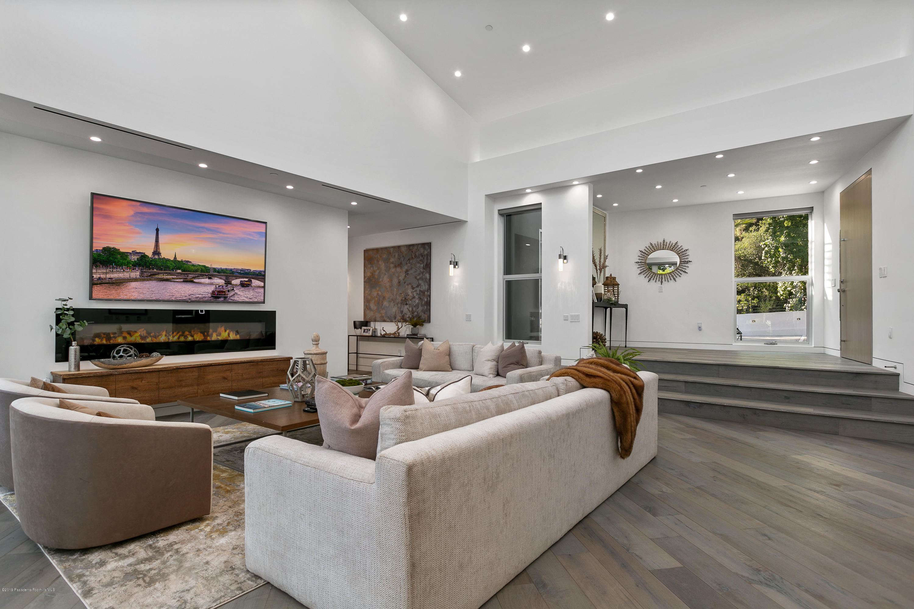 4402 Wasatch Drive La Canada Flintridge, CA 91011 - Photo 5 of 62 a living room with fireplace furniture and a flat screen tv