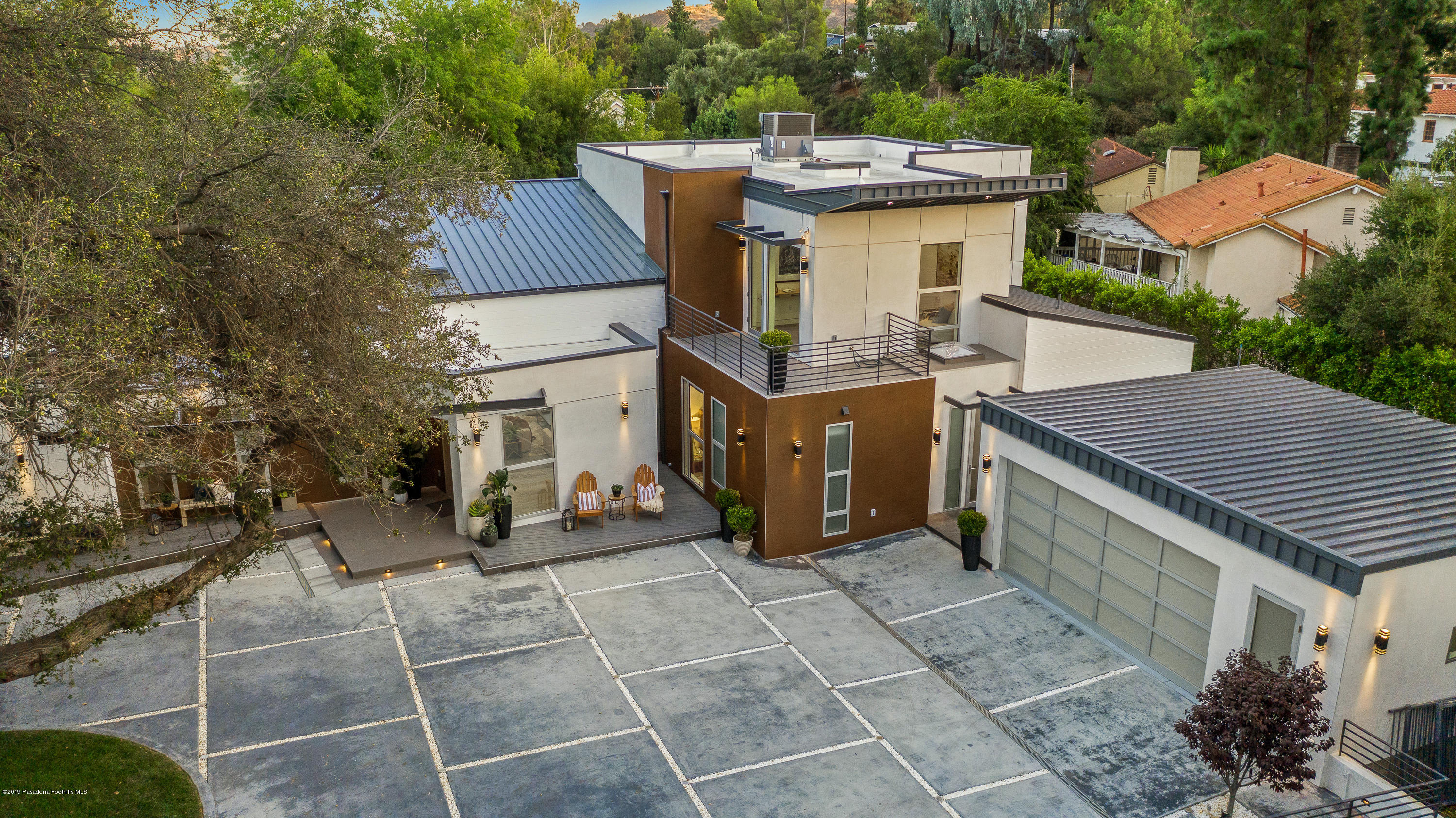 4402 Wasatch Drive La Canada Flintridge, CA 91011 - Photo 58 of 62 a view of a house with a barbeque and large trees