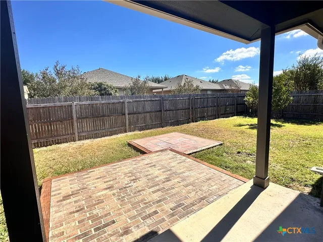 a view of swimming pool from a balcony