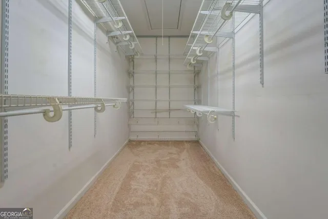 a utility room with a sink and washer