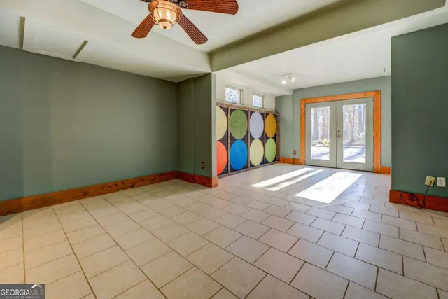a view of a room with window and cabinet