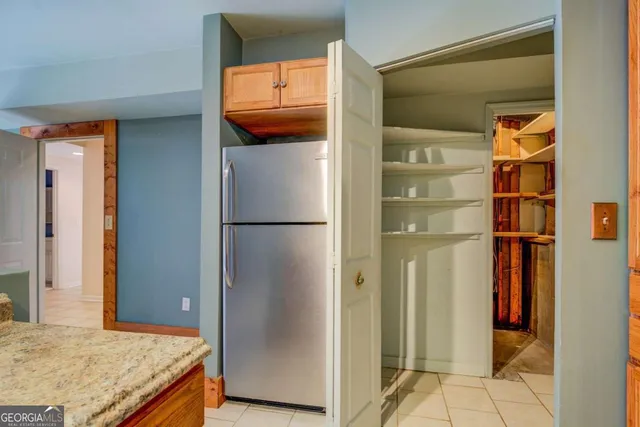 a view of a yard with a tree