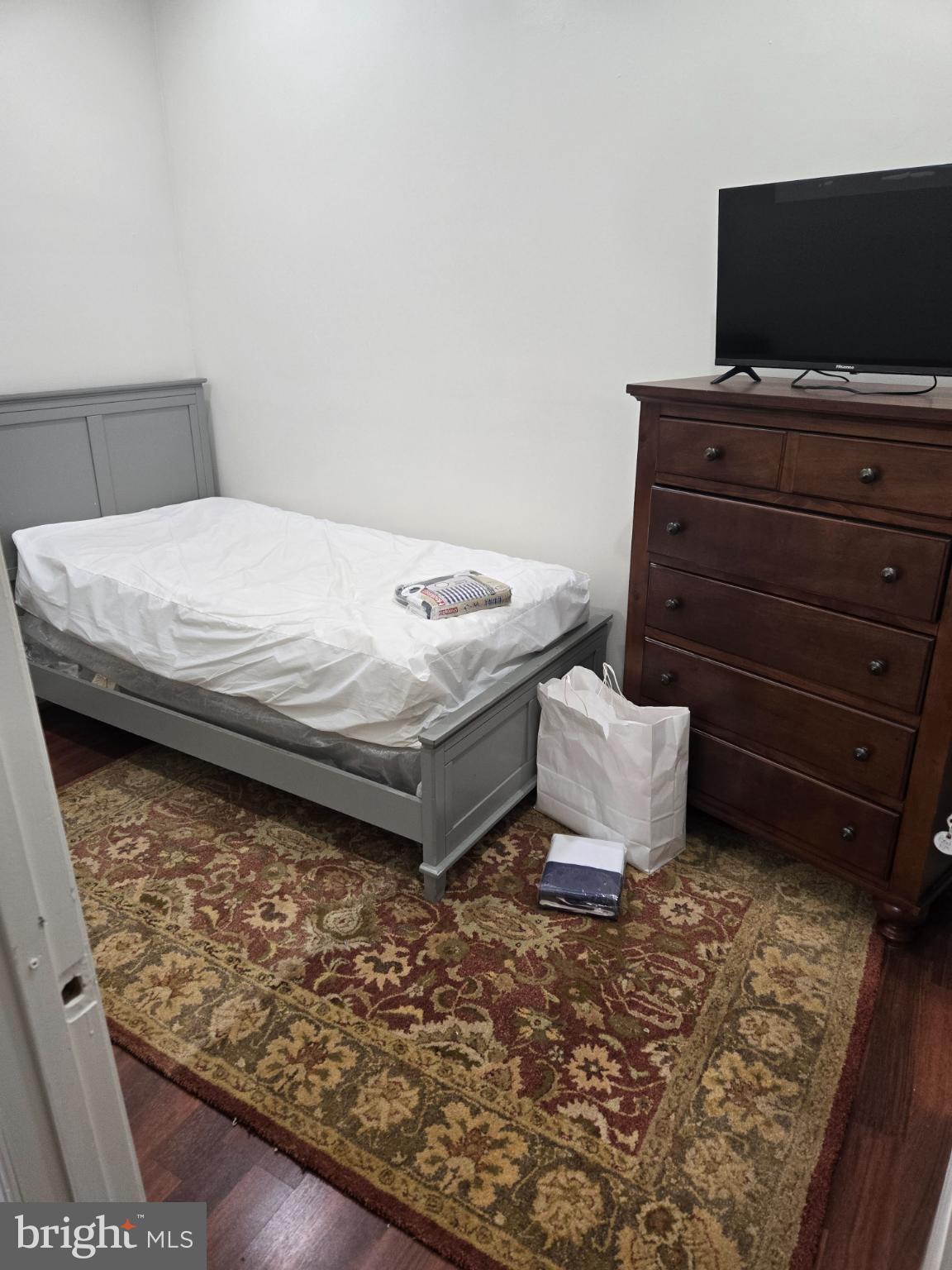 401 O Street Northwest Washington, DC 20001 - Photo 12 of 41 a bedroom with a bed and flat screen tv