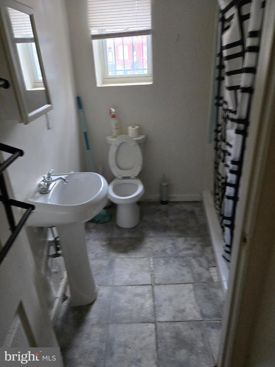 401 O Street Northwest Washington, DC 20001 - Photo 23 of 41 a bathroom with a toilet and a sink