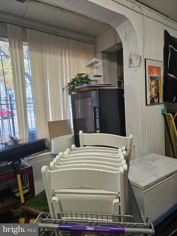 a kitchen with a refrigerator and a stove