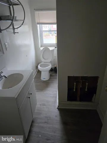a stove top oven sitting inside of a kitchen