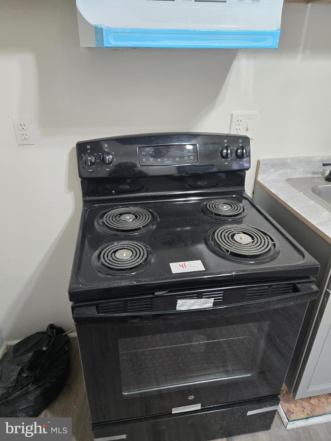401 O Street Northwest Washington, DC 20001 - Photo 33 of 41 a stove top oven sitting inside of a kitchen
