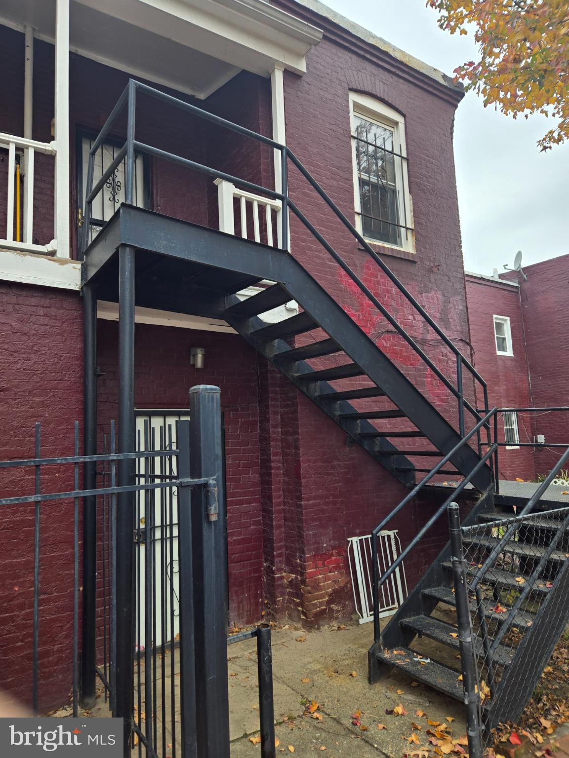 401 O Street Northwest Washington, DC 20001 - Photo 9 of 41 a front view of a building with glass windows and iron fence