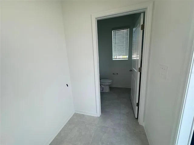 a view of a bathroom with a toilet